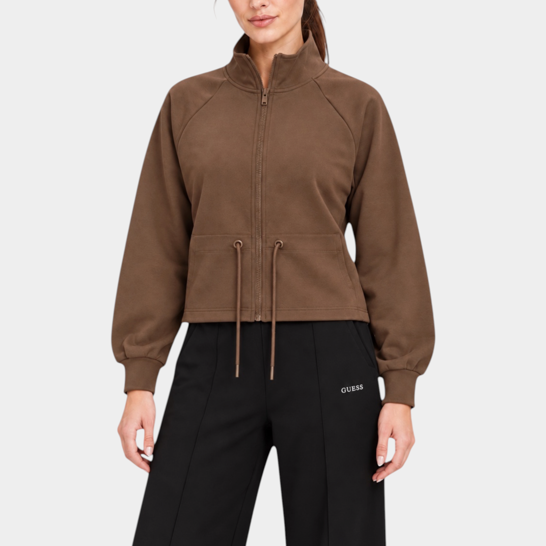 Felpa full zip marrone Follower SRL con collo alto e coulisse in vita indossata da una modella