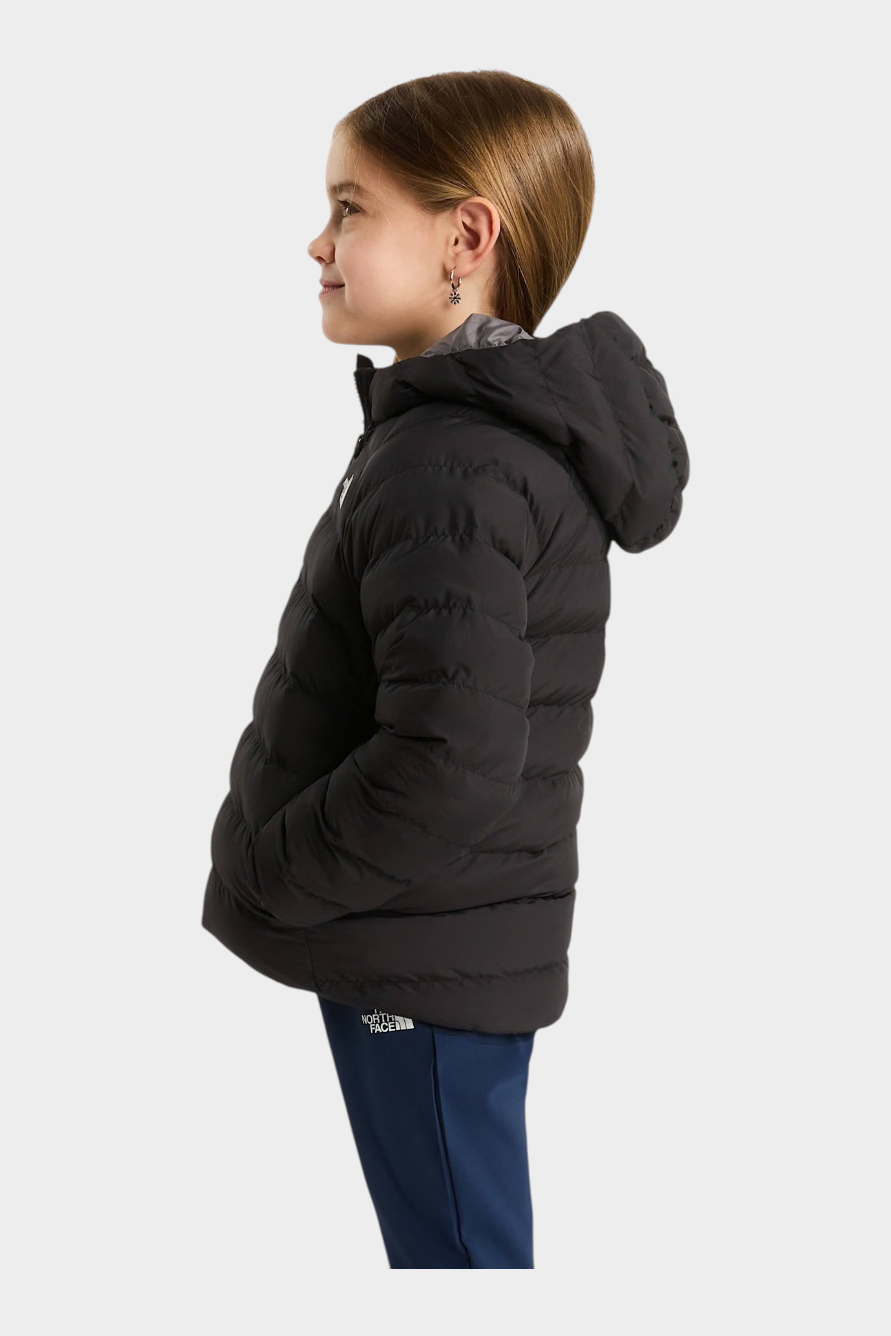 Bambina indossa giacca reversibile imbottita nera con cappuccio The North Face venduta da Follower SRL