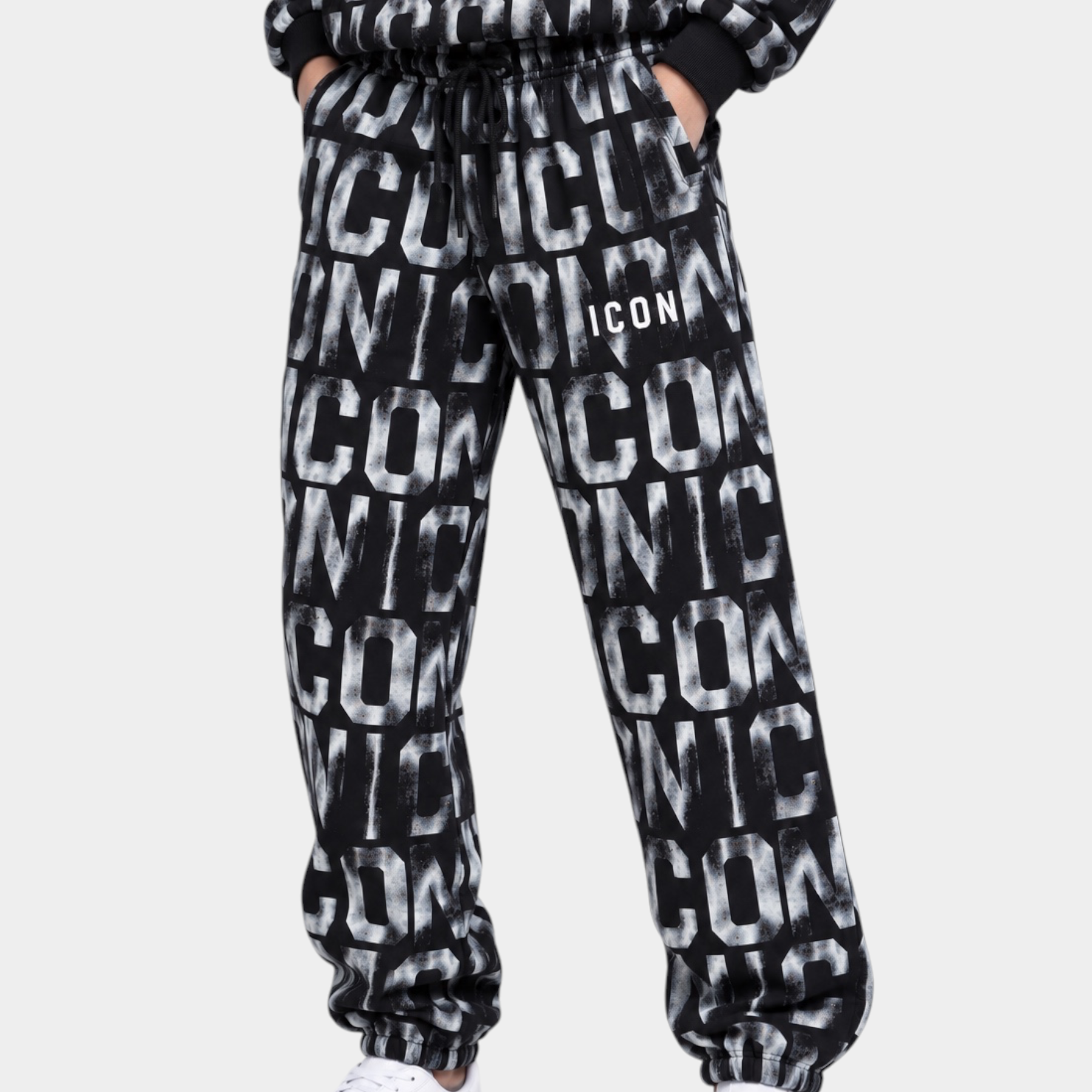 Pantaloni jogger neri Follower Official con stampa all-over ICON, vita elasticizzata e polsini a costine per bambino