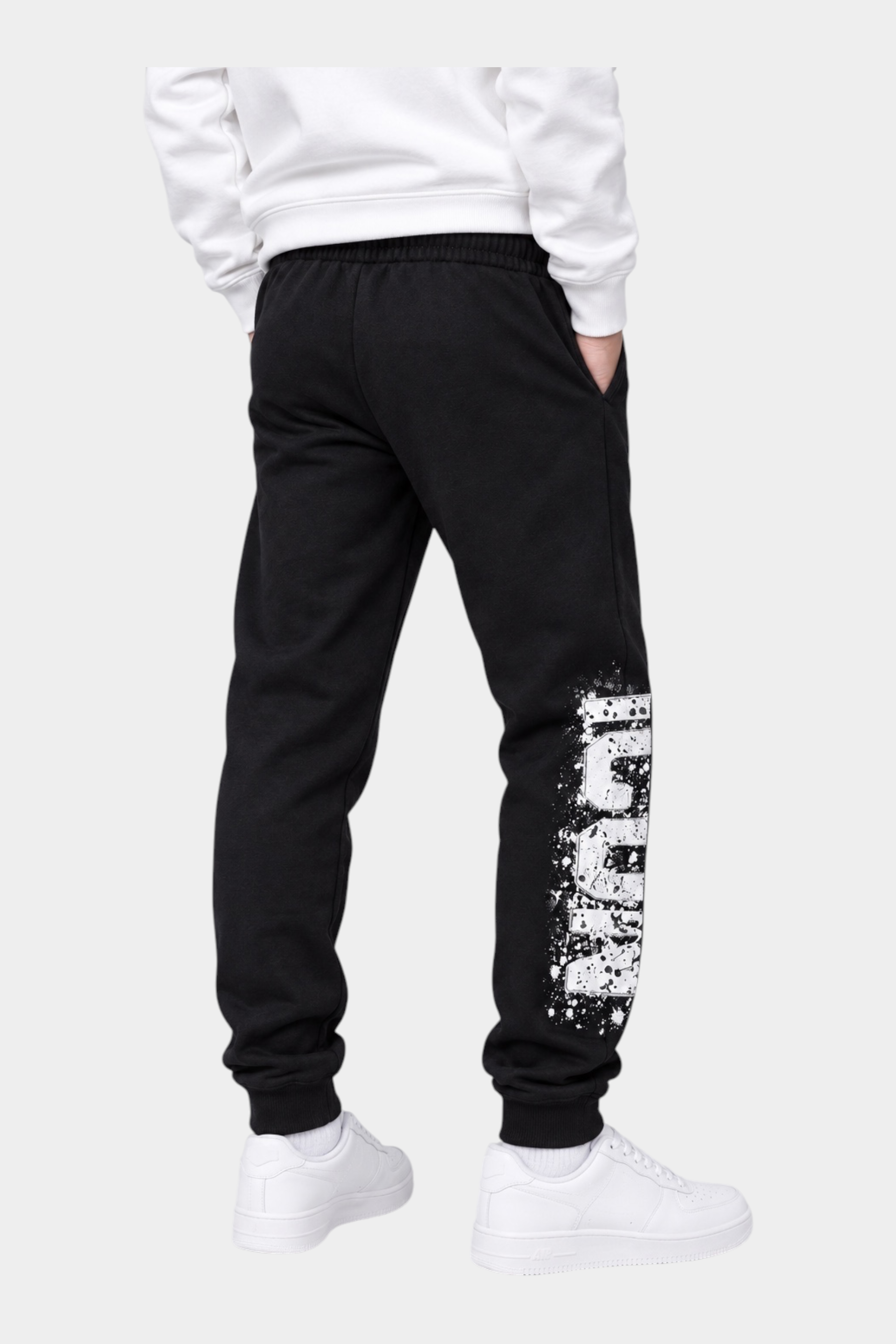 Pantaloni jogger neri Follower Official per bambino con stampa ICON bianca effetto vernice sulla gamba