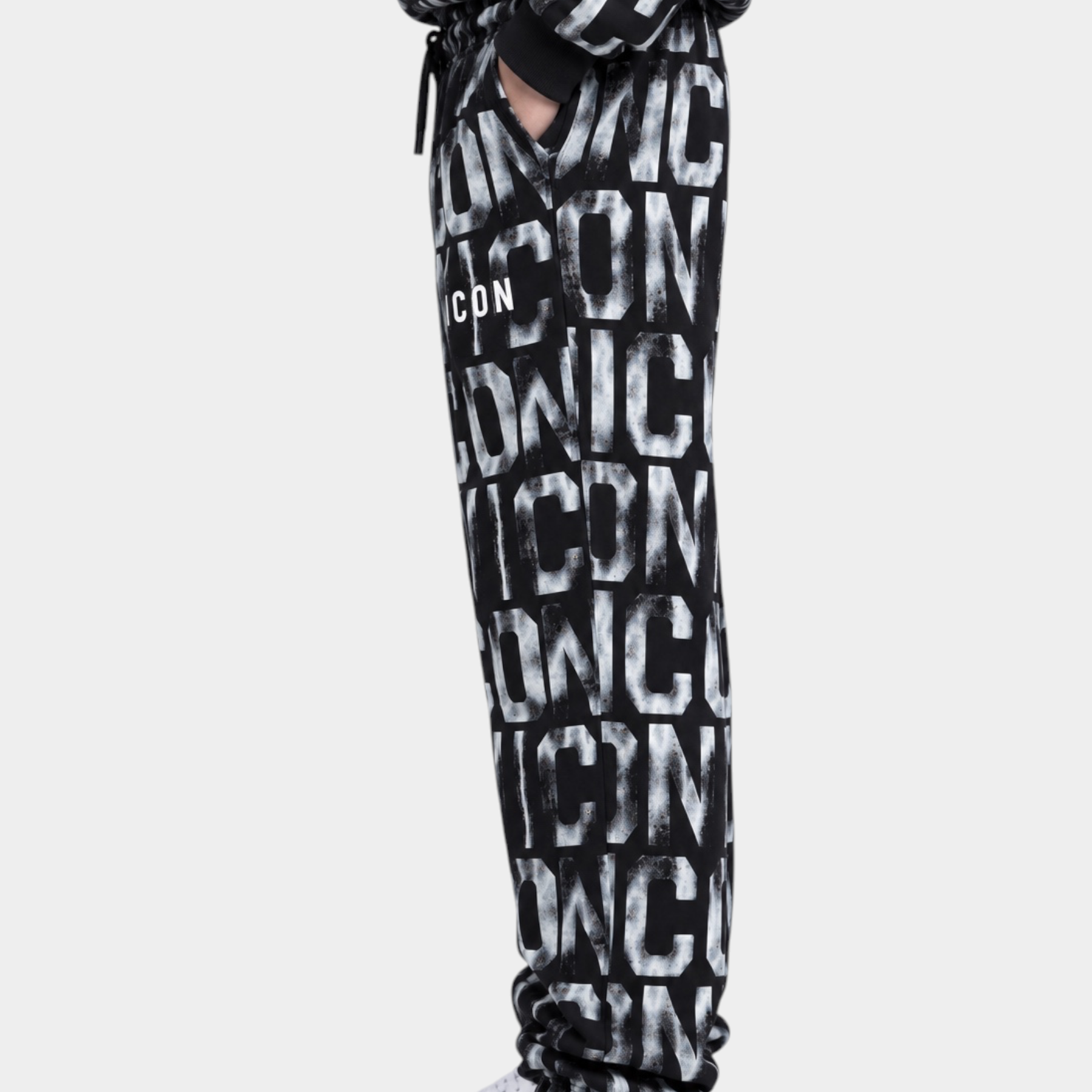 Pantaloni jogger Follower Official neri per bambino con stampa logo ICON all-over, vita elasticizzata e bordi a costine