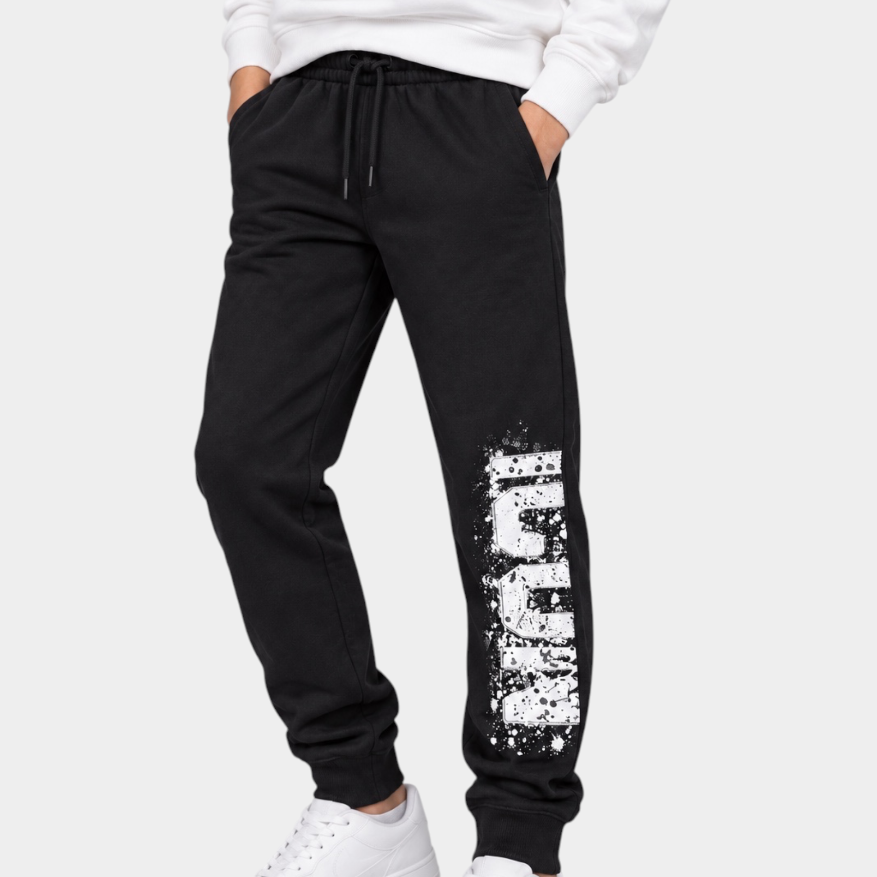 Pantaloni jogger neri Follower Official per bambino con stampa ICON bianca effetto vernice e coulisse in vita