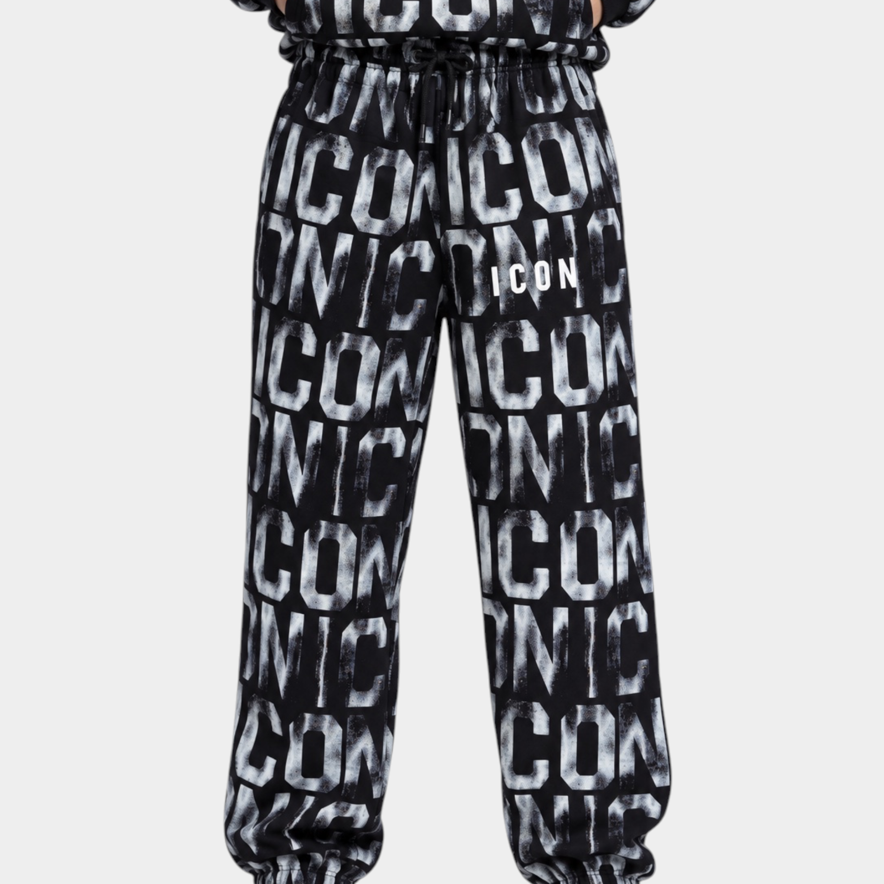 Pantaloni jogger Follower Official neri per bambino con stampa logo ICON all-over, vita elasticizzata e polsini a costine