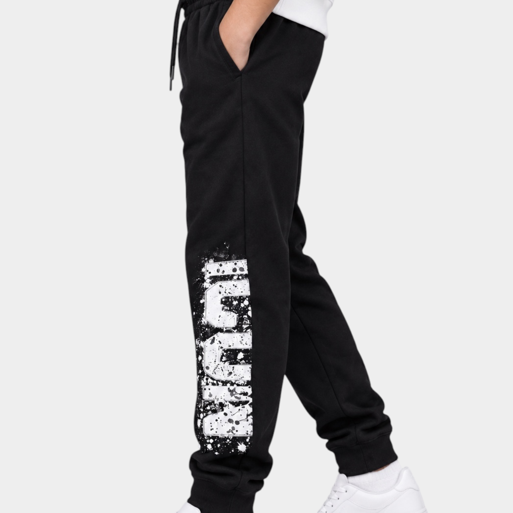 Pantaloni jogger Follower Official neri per bambino con stampa ICON bianca effetto vernice e vita elasticizzata