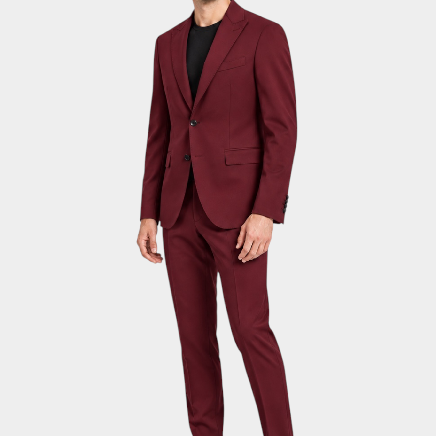 Modello indossa abito monopetto Follower SRL bordeaux in misto poliestere con t-shirt nera e scarpe eleganti