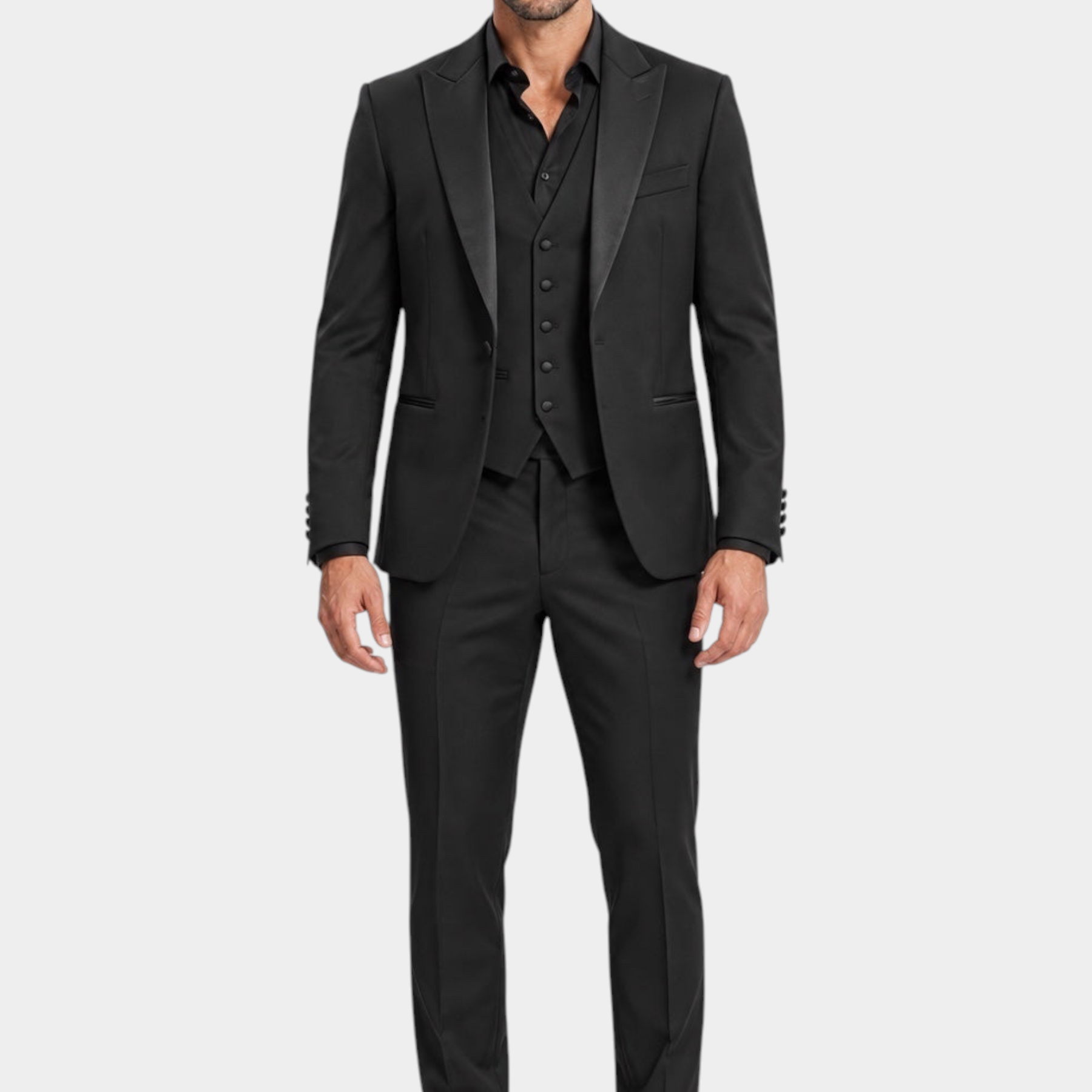 Modello indossa abito tre pezzi nero Follower SRL con giacca monopetto, gilet e pantaloni sartoriali Made in Italy