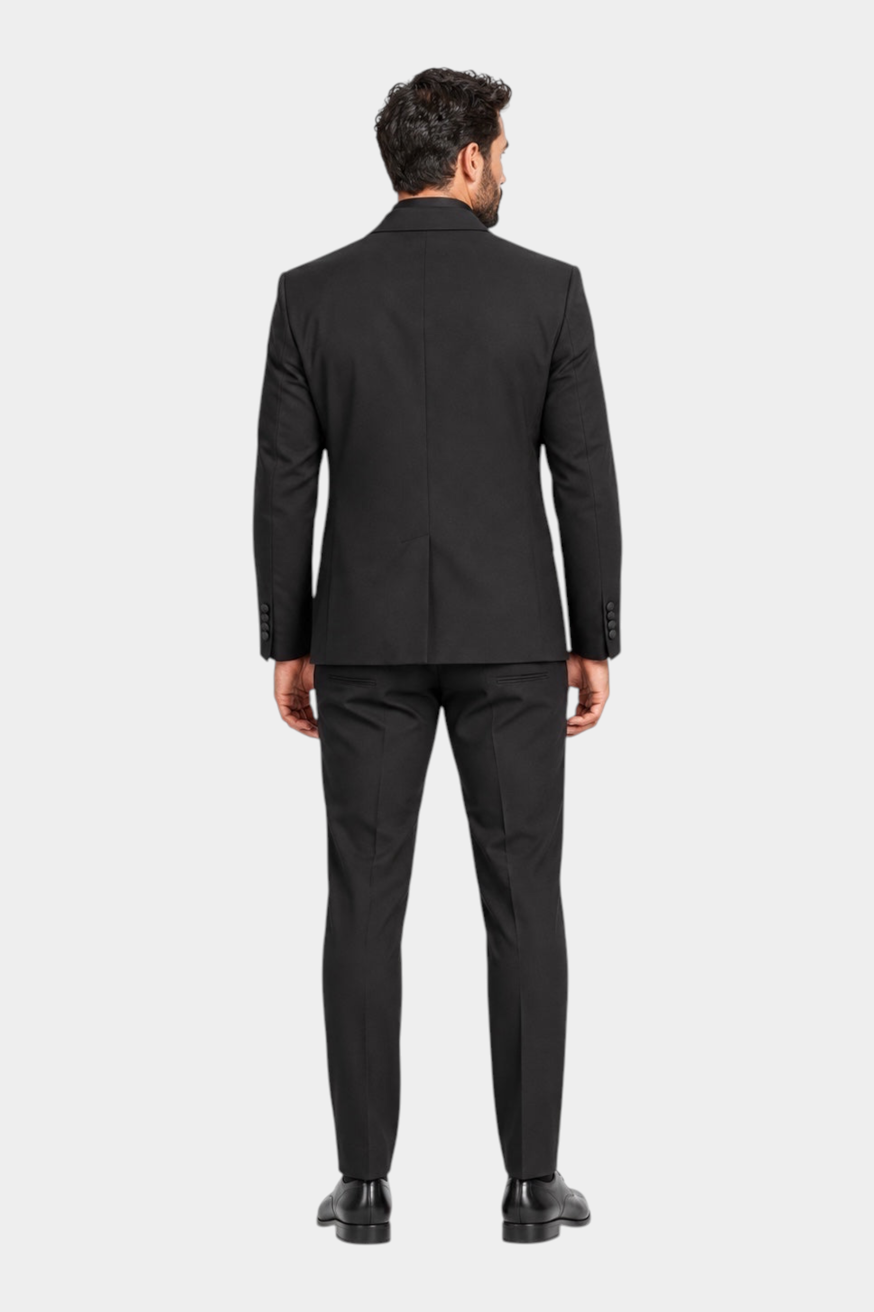 Vista posteriore di un abito tre pezzi nero Follower SRL, modello monopetto sartoriale Made in Italy