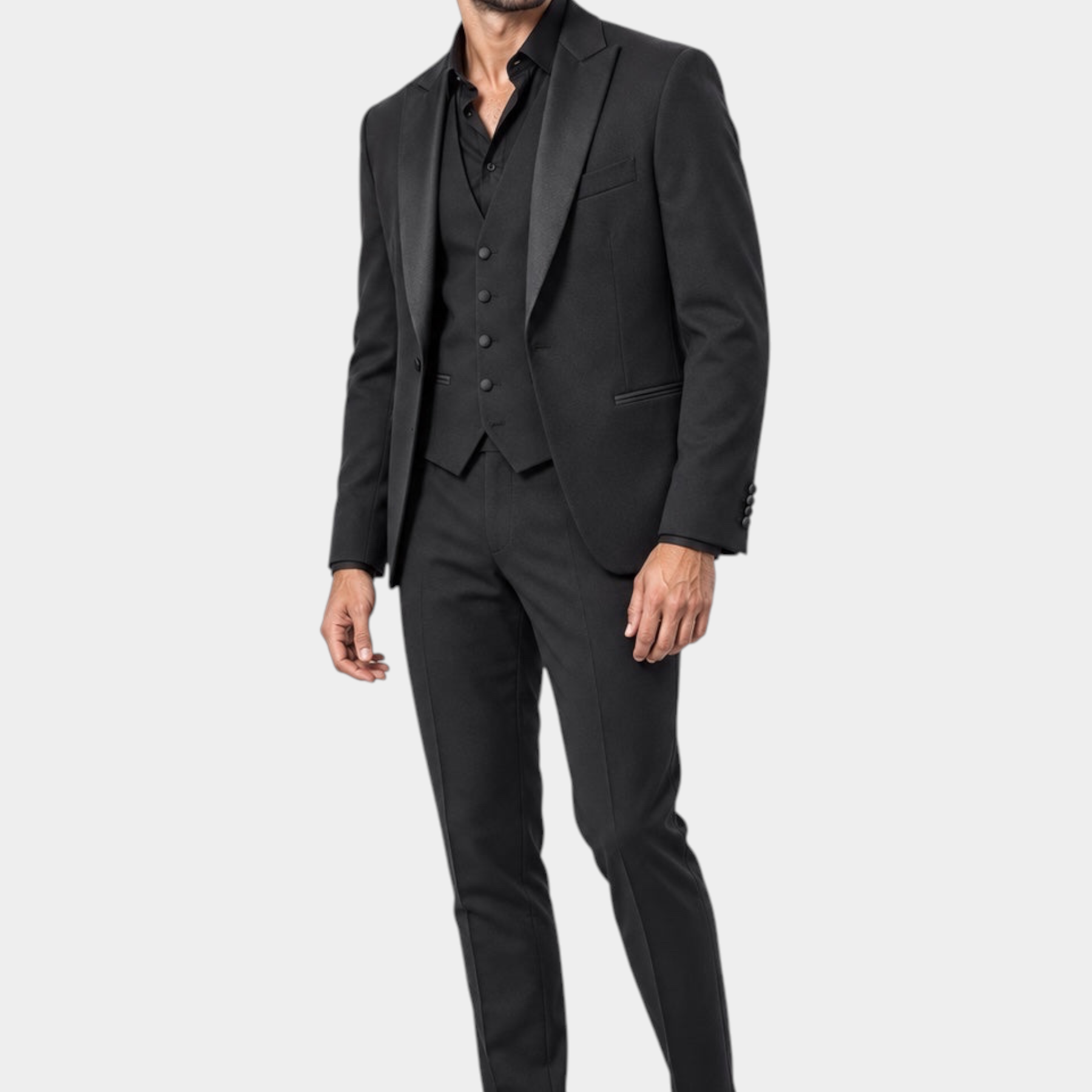 Modello indossa abito tre pezzi nero Follower SRL con giacca monopetto, gilet e pantaloni sartoriali Made in Italy