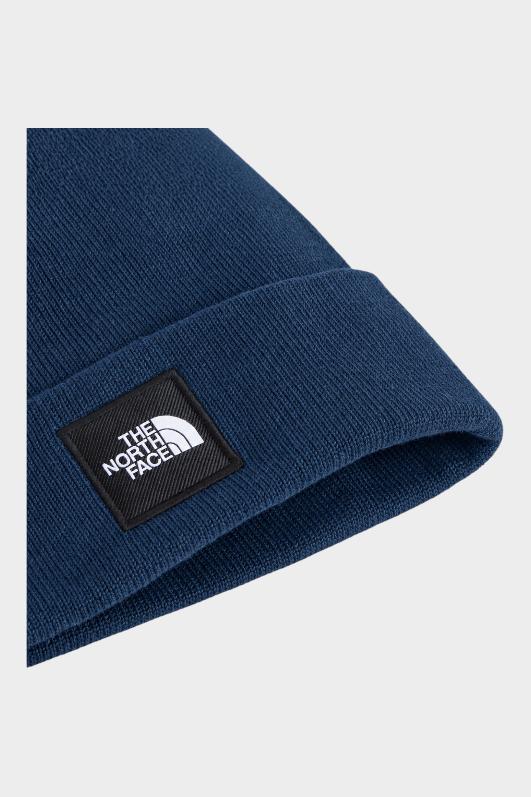 Berretto Dock Worker Follower SRL blu in maglia a coste con logo The North Face applicato sul risvolto