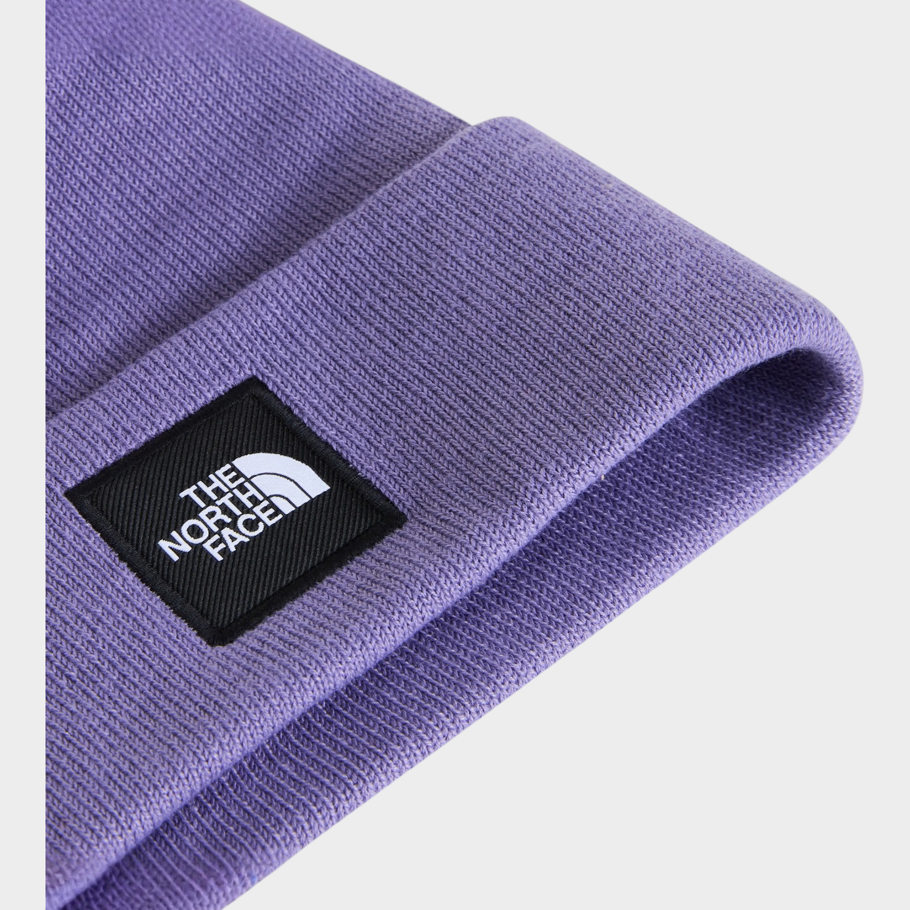 Berretto Dock Worker Follower SRL color lilla con logo The North Face cucito sul risvolto in maglia a coste