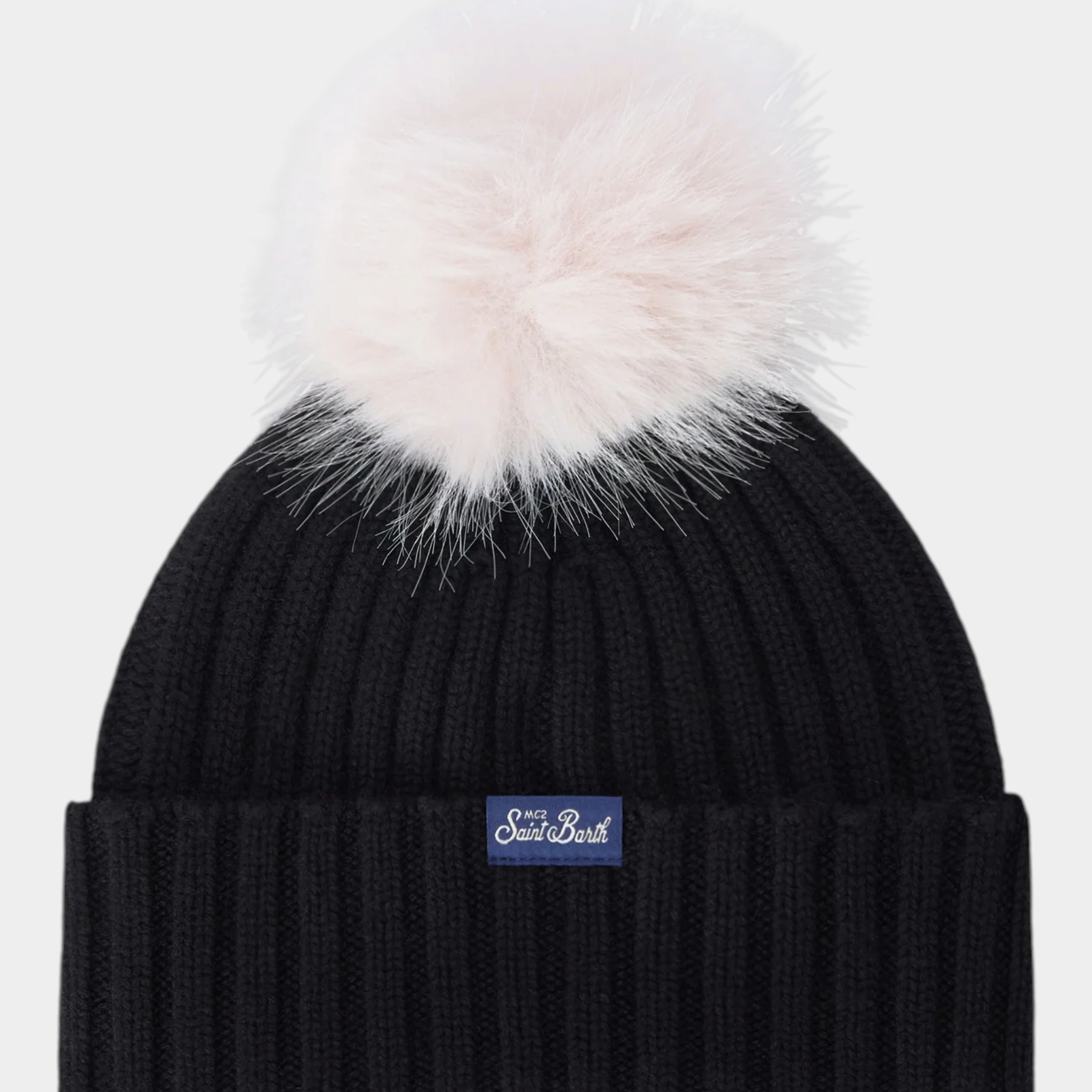 Berretto Follower SRL Wengen nero a costine con risvolto e pompon panna removibile per bambina
