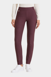 Follower SRL bordeaux cigarette trousers with belt loops and a slim fit, worn with white sneakers.