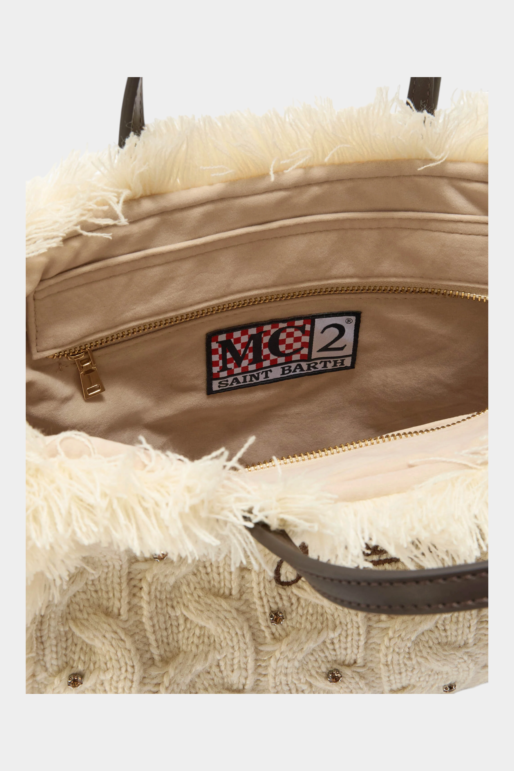 Interno della borsa Follower SRL MC2 SAINT BARTH in maglia avorio con etichetta logo e dettagli in strass