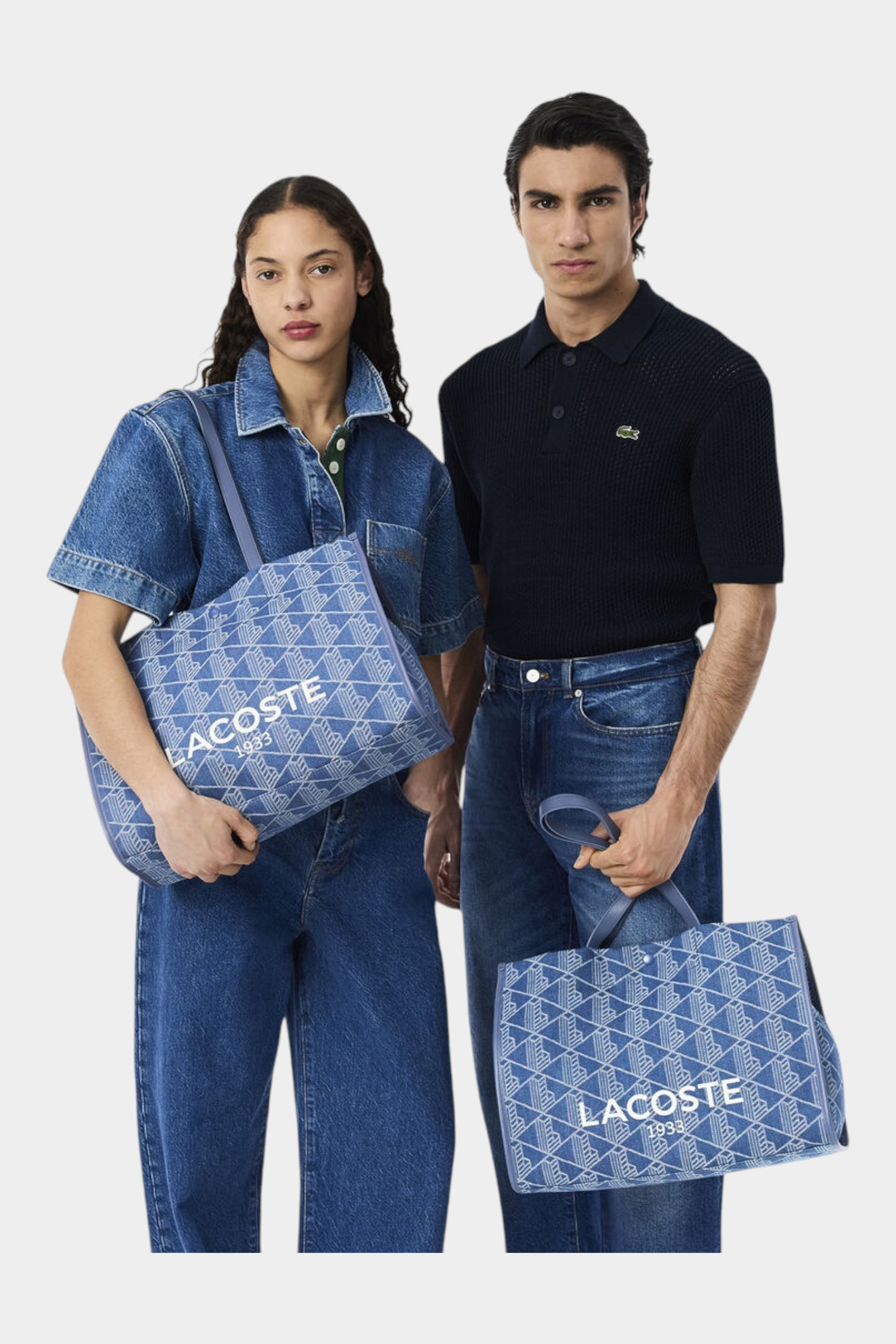 Modelli con borse Follower SRL Lacoste grandi in jacquard blu con stampa Heritage e logo bianco