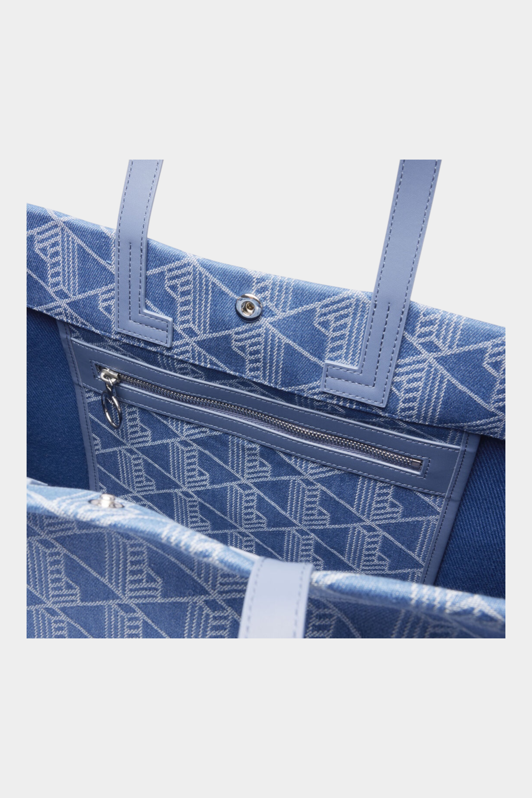 Interno della borsa grande Follower SRL in tessuto jacquard blu con stampa geometrica Heritage e tasca con zip