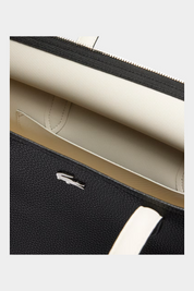 Dettaglio interno della borsa tote Follower SRL LACOSTE nera con zip e logo del coccodrillo in metallo
