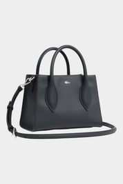 Borsetta Daily City nera LACOSTE di Follower SRL con texture micro-piquet, doppi manici e tracolla regolabile