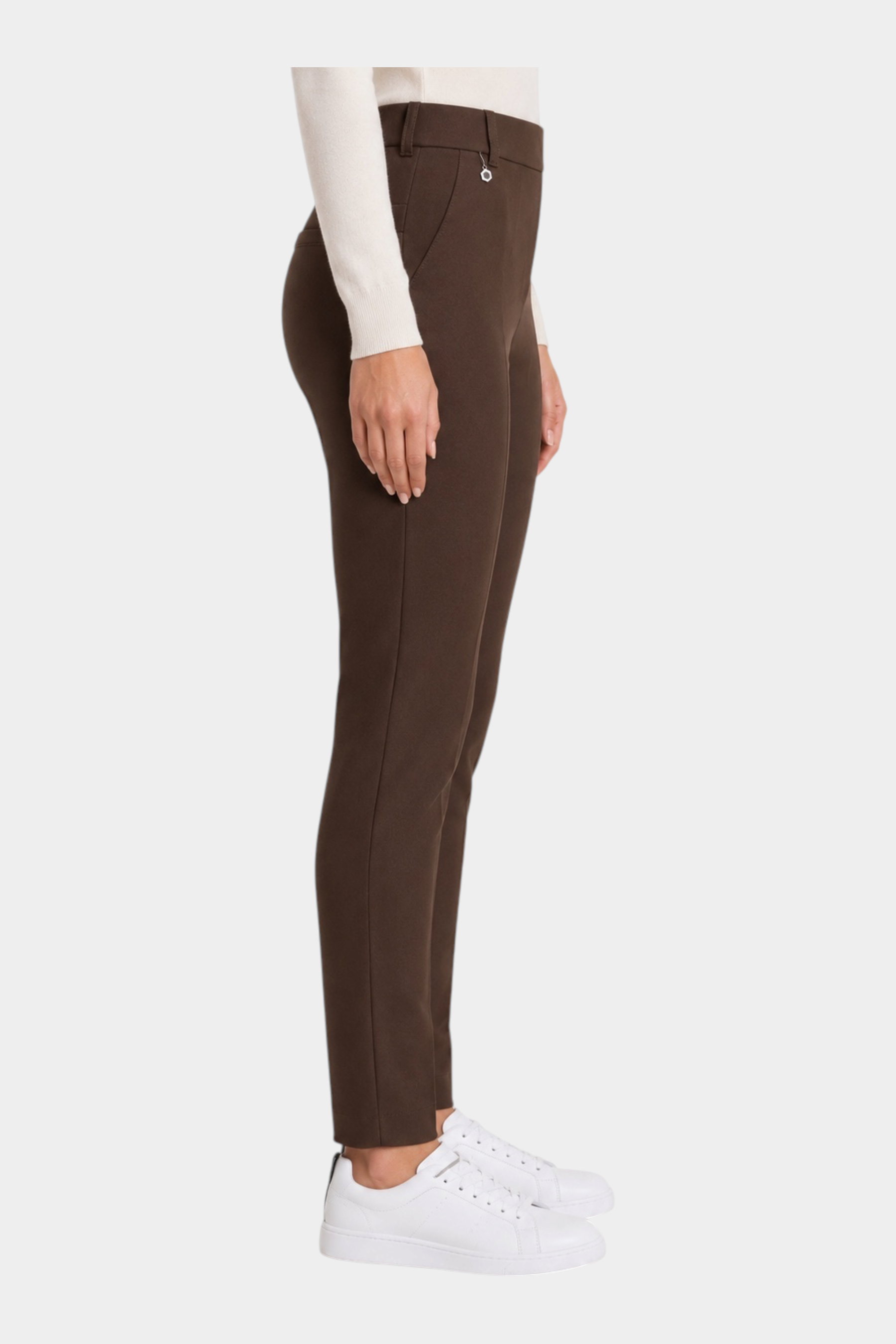 Follower SRL brown cigarette trousers with belt loops and side pockets worn by a woman with white sneakers