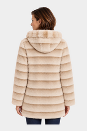 Cappotto reversibile lungo con cappuccio beige Follower SRL indossato da una donna, vista posteriore