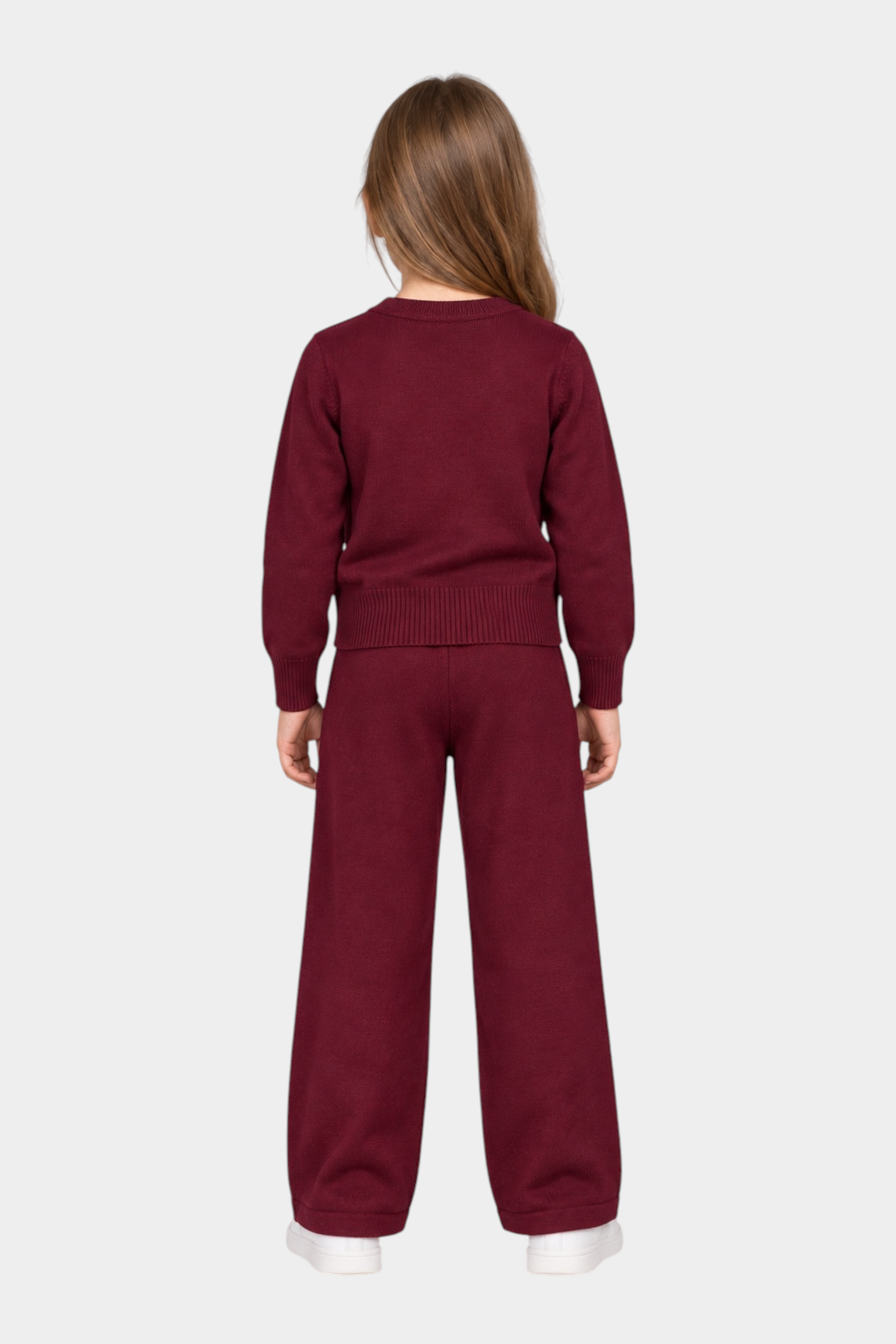 Bambina di spalle indossa completo Follower SRL bordeaux composto da maglia e pantaloni in maglia a gamba larga