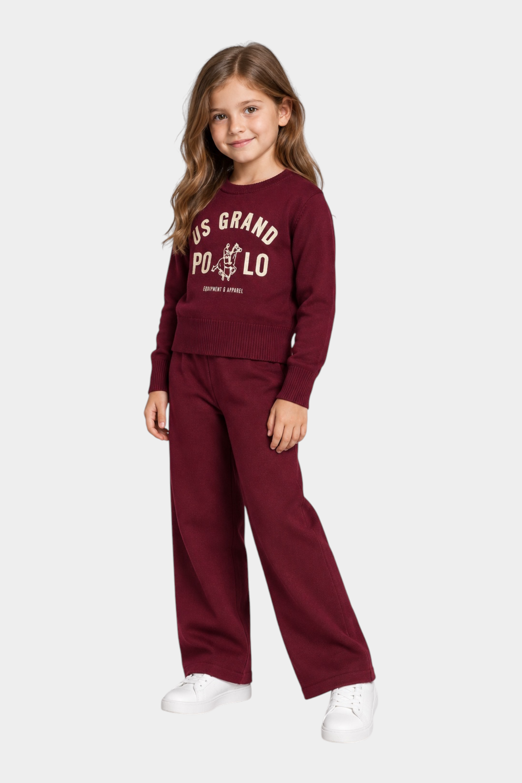 Bambina indossa completo Follower SRL bordeaux con maglione a girocollo e pantaloni ampi in maglia