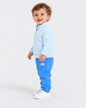 Bambino che indossa un completo in pile azzurro Follower SRL composto da felpa con zip e pantaloni coordinati