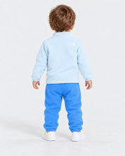 Completo due pezzi in pile Follower SRL per bambino, giacca azzurro chiaro e pantaloni blu con logo The North Face