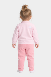 Bambina di spalle indossa un completo due pezzi in pile rosa Follower SRL The North Face con logo ricamato