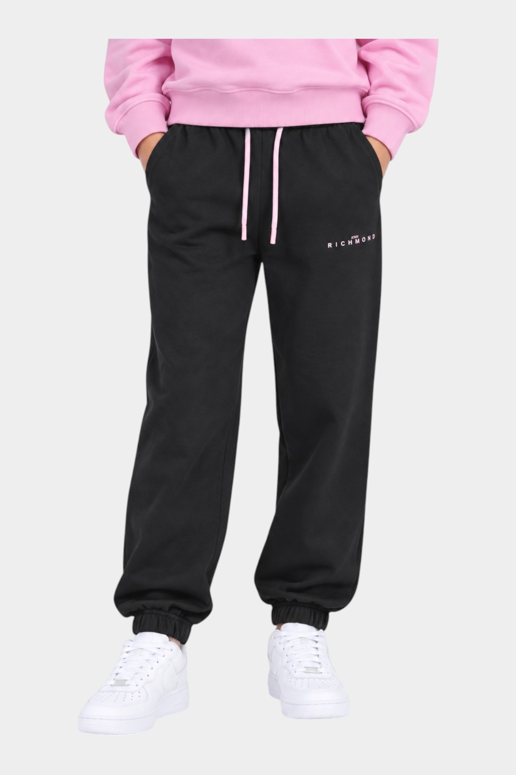 Completo sportivo Follower SRL per bambina con felpa rosa e pantaloni neri con logo RICHMOND e coulisse