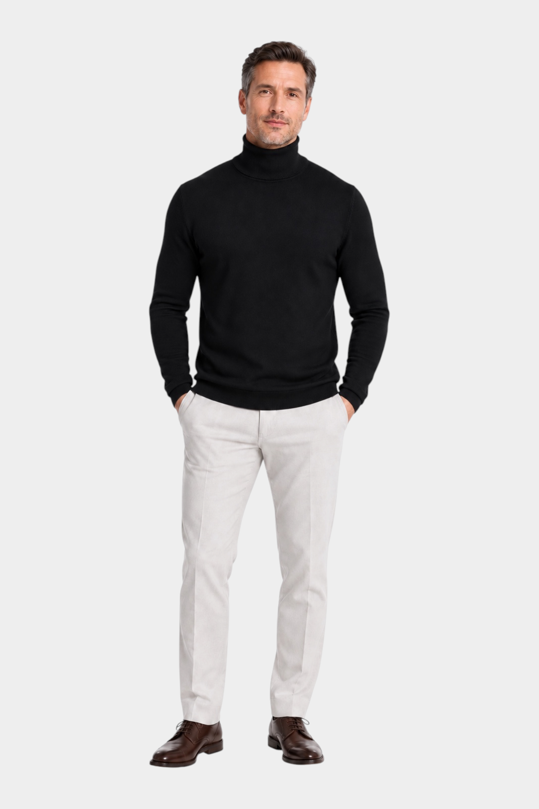 Modello indossa dolcevita nero in filo Ragno con pantaloni chiari e scarpe eleganti, stile casual Follower SRL