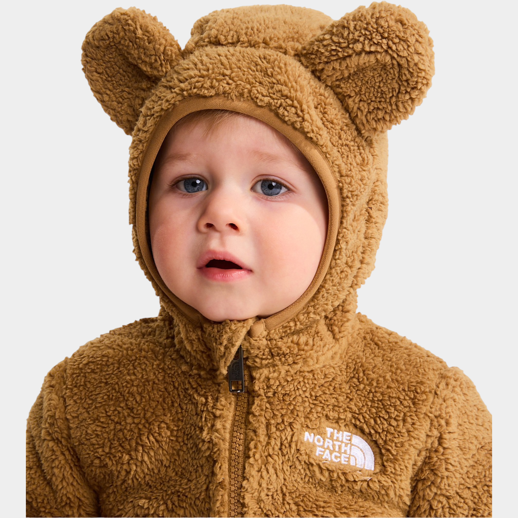 Bambino che indossa una felpa con cappuccio Follower SRL The North Face Campshire marrone in pile effetto orsetto