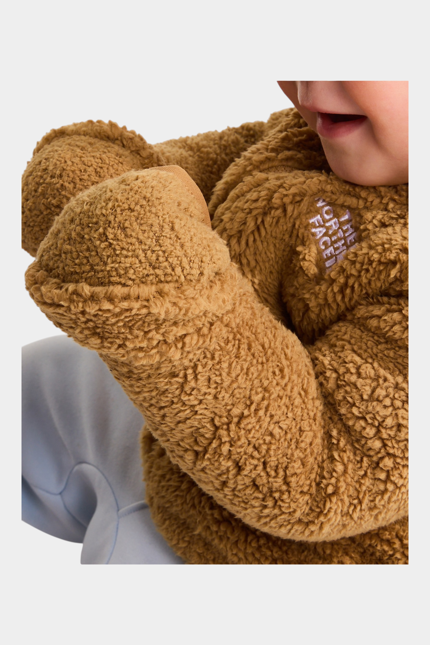 Felpa con cappuccio Campshire marrone in pile sherpa di Follower SRL indossata da un bambino