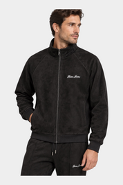 Felpa full zip in ciniglia nera da uomo GUESS indossata da un modello, firmata Follower SRL