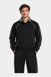 Modello indossa felpa full zip nera Follower SRL con dettagli a righe bianche su colletto e maniche