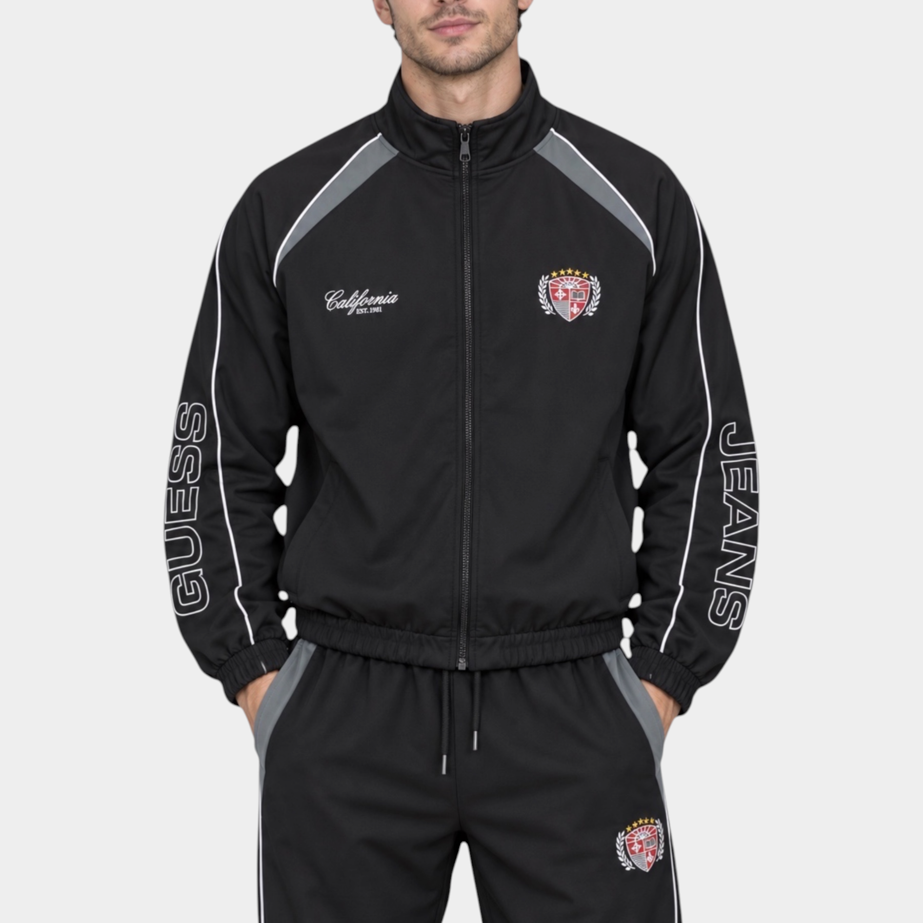 Modello indossa felpa giubbino in nylon nero Follower SRL GUESS con logo California e dettagli sportivi a contrasto