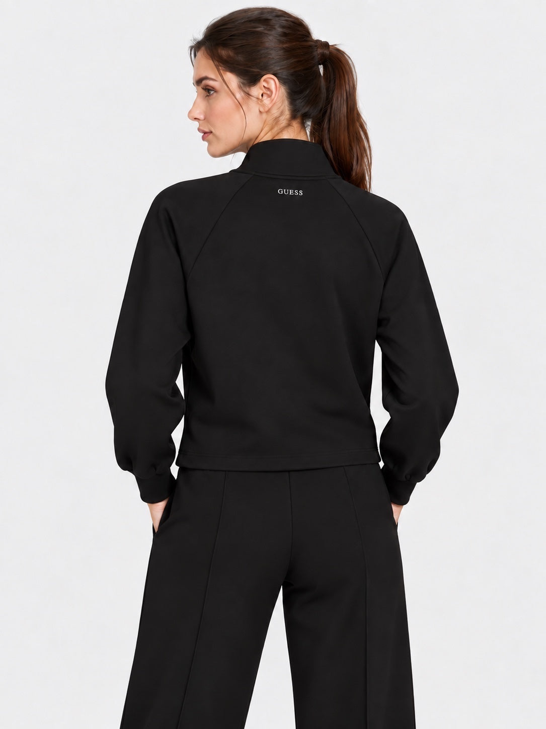 Felpa full zip nera da donna Follower SRL con logo GUESS sul retro e maniche a sbuffo
