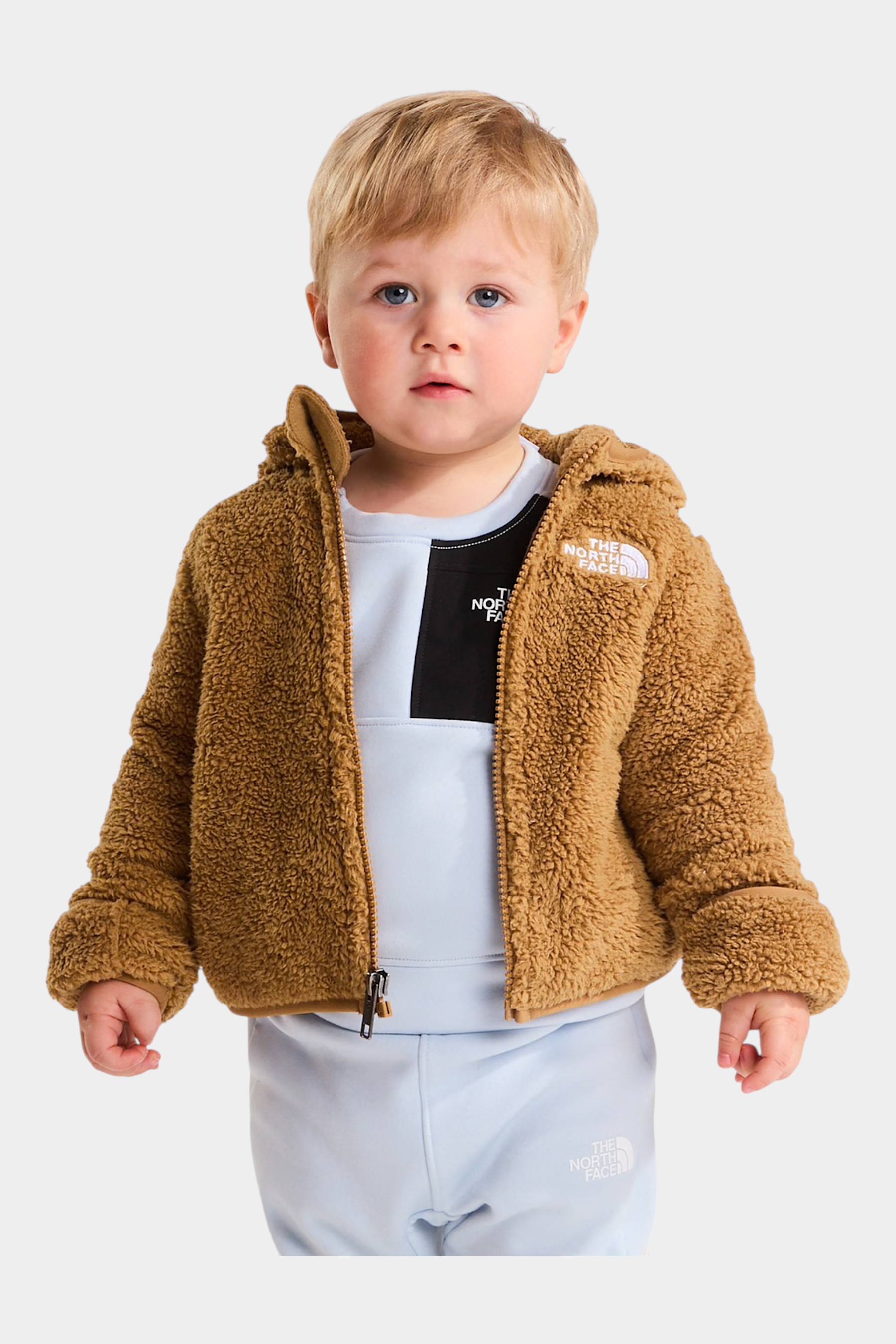 Bambino che indossa una felpa con cappuccio in pile marrone Follower SRL The North Face