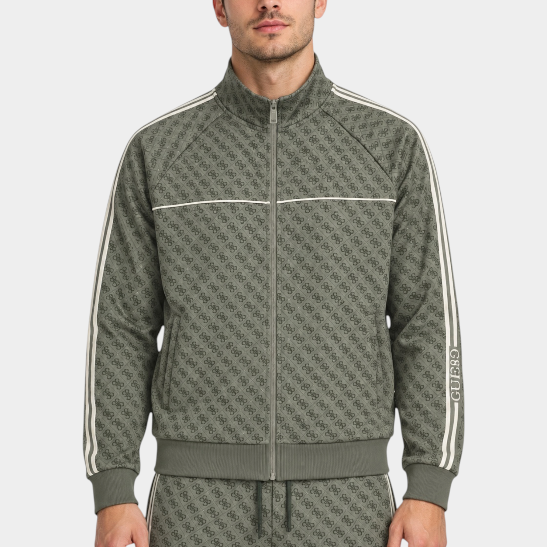 Felpa full zip Follower SRL verde con stampa logo iconico all-over e bande laterali a contrasto indossata da un uomo