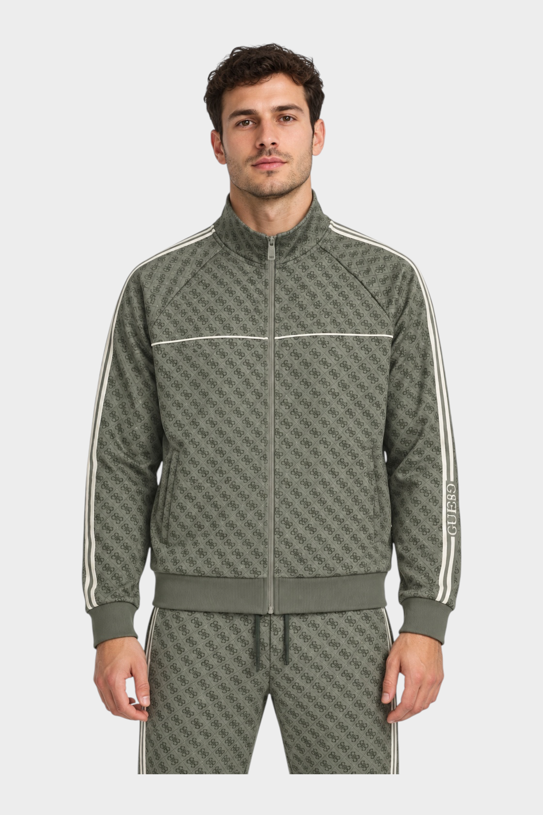 Felpa full zip Follower SRL verde con stampa logo iconico all-over e bande laterali a contrasto indossata da un uomo