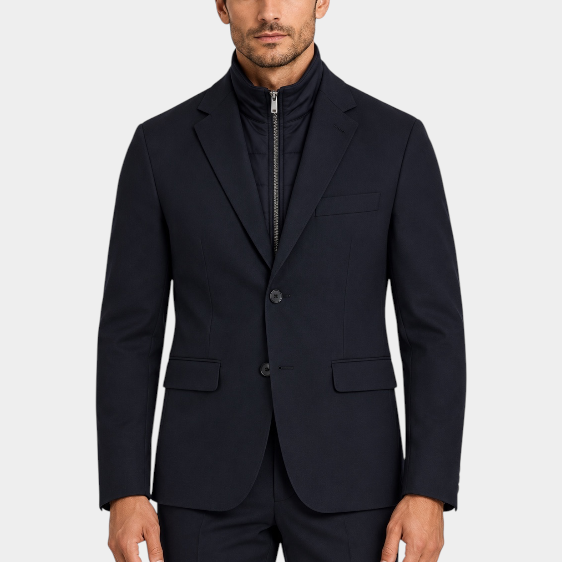 Giacca blu GUESS con zip interna e chiusura a bottoni indossata da un modello, proposta da Follower SRL