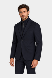 Giacca blu GUESS con inserto a zip interno indossata da un modello, proposta da Follower SRL
