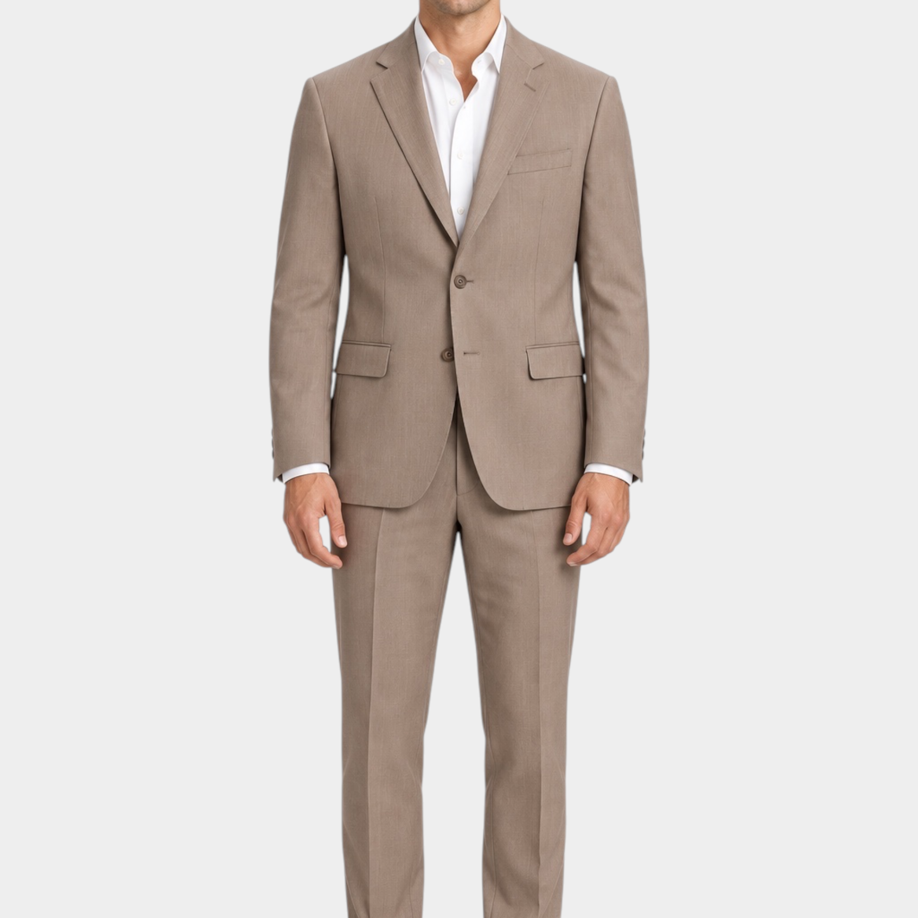 Modello indossa giacca monopetto beige GUESS proposta da Follower SRL con camicia bianca e mocassini marroni