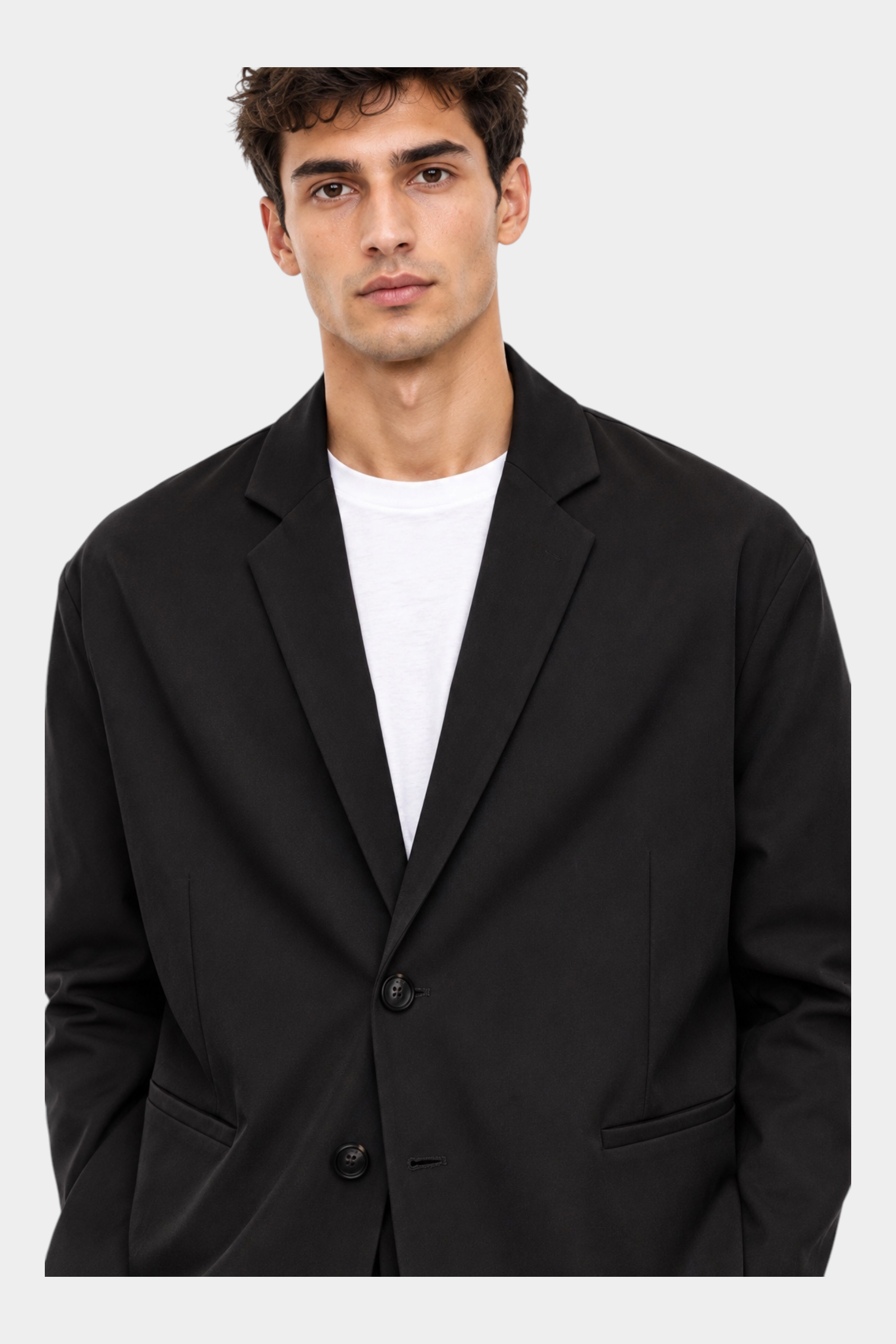 Giacca nera regular-fit IMPERIAL con due bottoni frontali indossata da un modello, proposta da Follower SRL