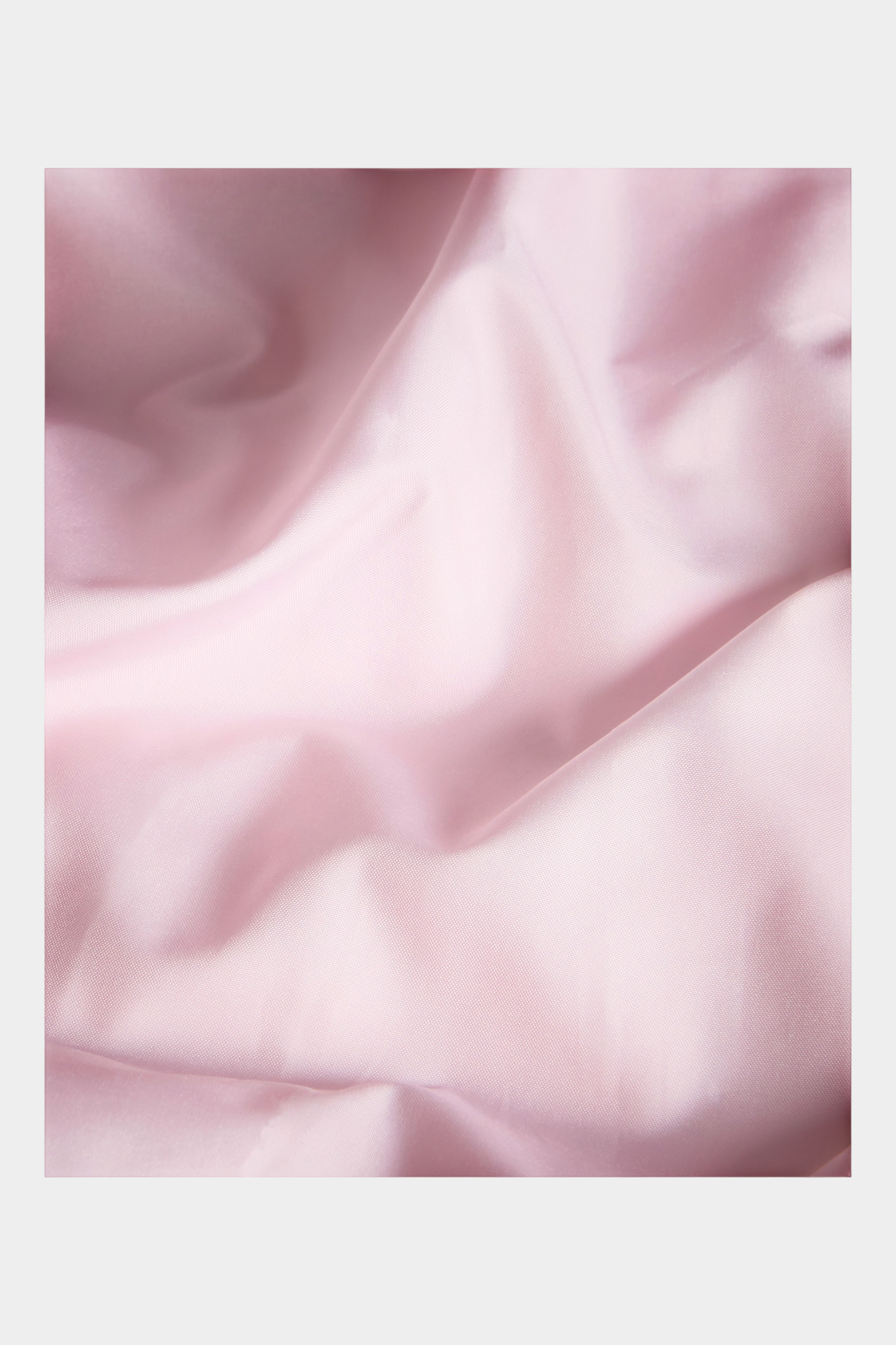 Dettaglio del tessuto tecnico rosa della giacca reversibile Perrito per bambina di Follower SRL