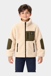 Bambino indossa giacca in pile Follower SRL color avorio con inserti verdi e chiusura a zip