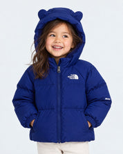 Bambina che indossa una giacca in piumino blu Follower SRL con cappuccio e orecchie decorative