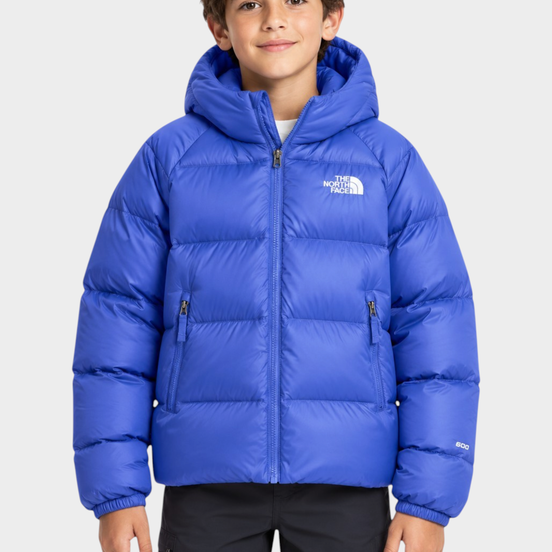 Ragazzo indossa giacca in piumino blu con cappuccio The North Face Hydrenalite™ venduta da Follower SRL