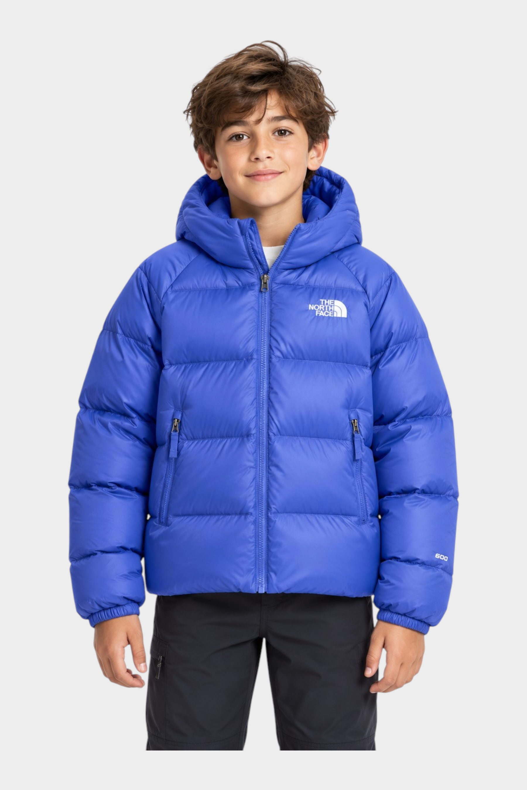 Ragazzo indossa giacca in piumino blu con cappuccio The North Face Hydrenalite™ venduta da Follower SRL