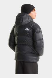 Ragazzo indossa giacca in piumino nera con cappuccio Follower SRL THE NORTH FACE, vista posteriore