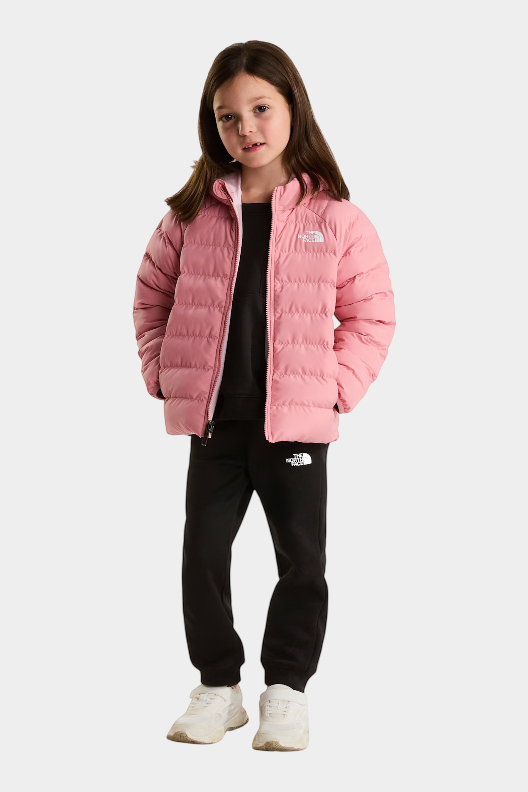 Bambina indossa giacca reversibile rosa The North Face modello Perrito, proposta da Follower SRL